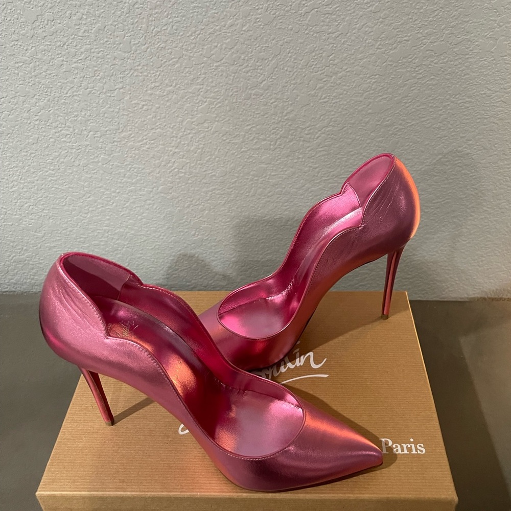 Authentic Christian Louboutin Metallic leather Hot Chick pumps.